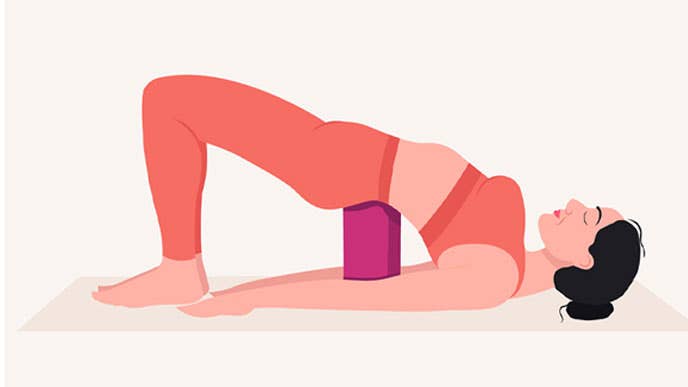 Illustration of a woman in Supported Bridge restorative yoga pose (Setu Bandha Sarvangasana)